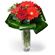 Carmen. A delicate and stylish arrangement of red gerberas and roses in a vase.