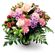Veronica. A tender and charming bouquet of roses, carnations, alstroemerias and chrysanthemums in pink and lilac colors.