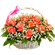 Poetry of feelings. Beautifully decorated basket of pink roses with assorted greens.